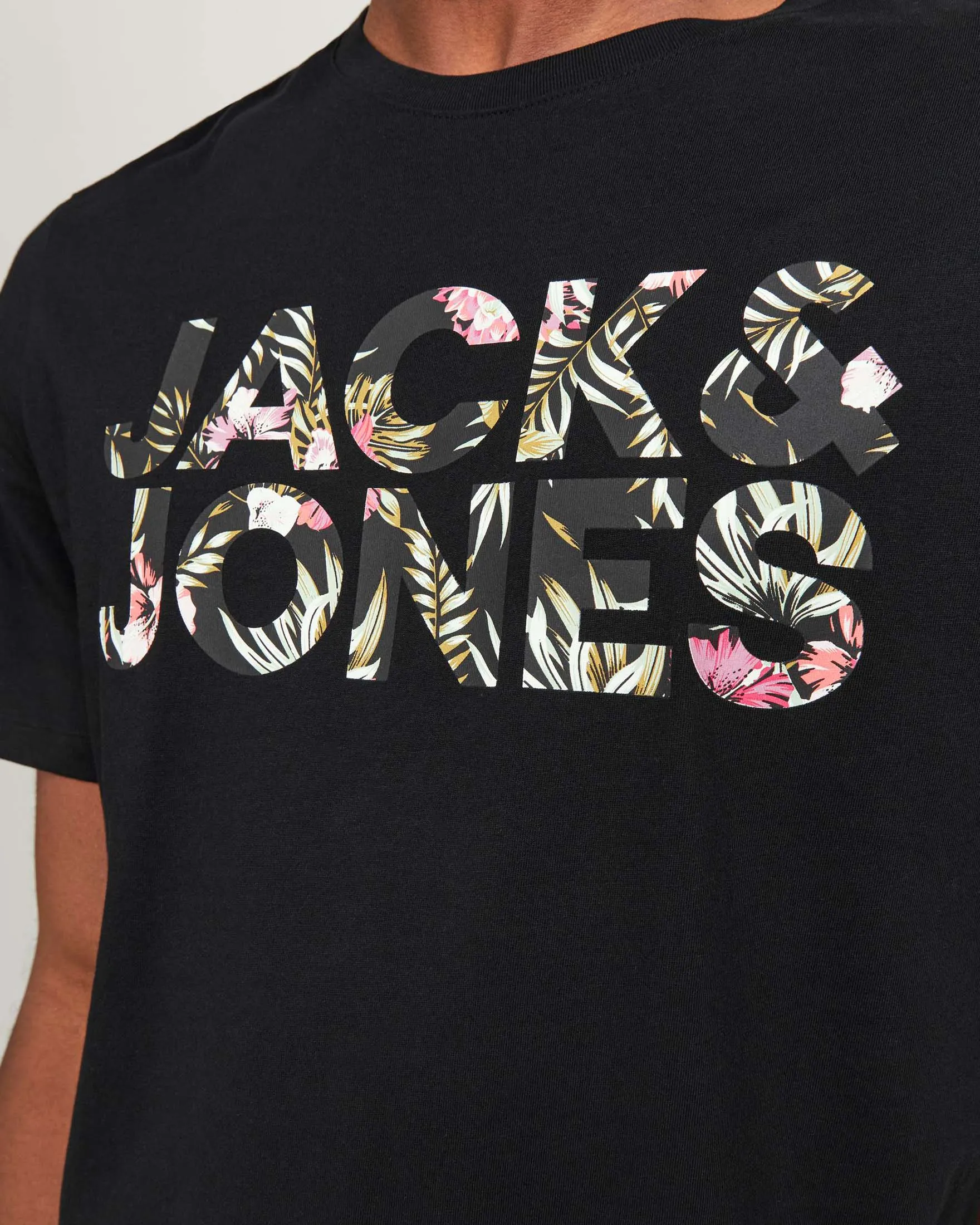 Black regular-fit T-shirt in pure cotton with front logo print in floral pattern
