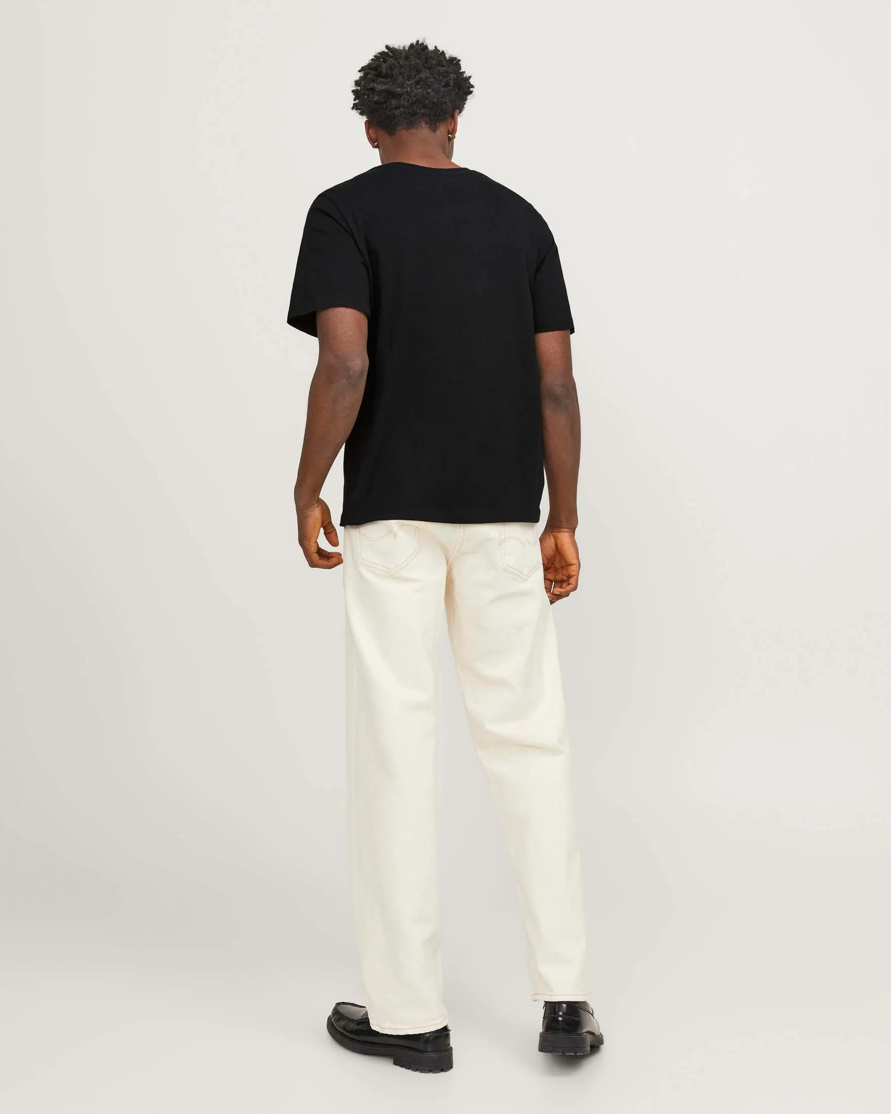Black regular-fit T-shirt in pure cotton with front logo print in floral pattern